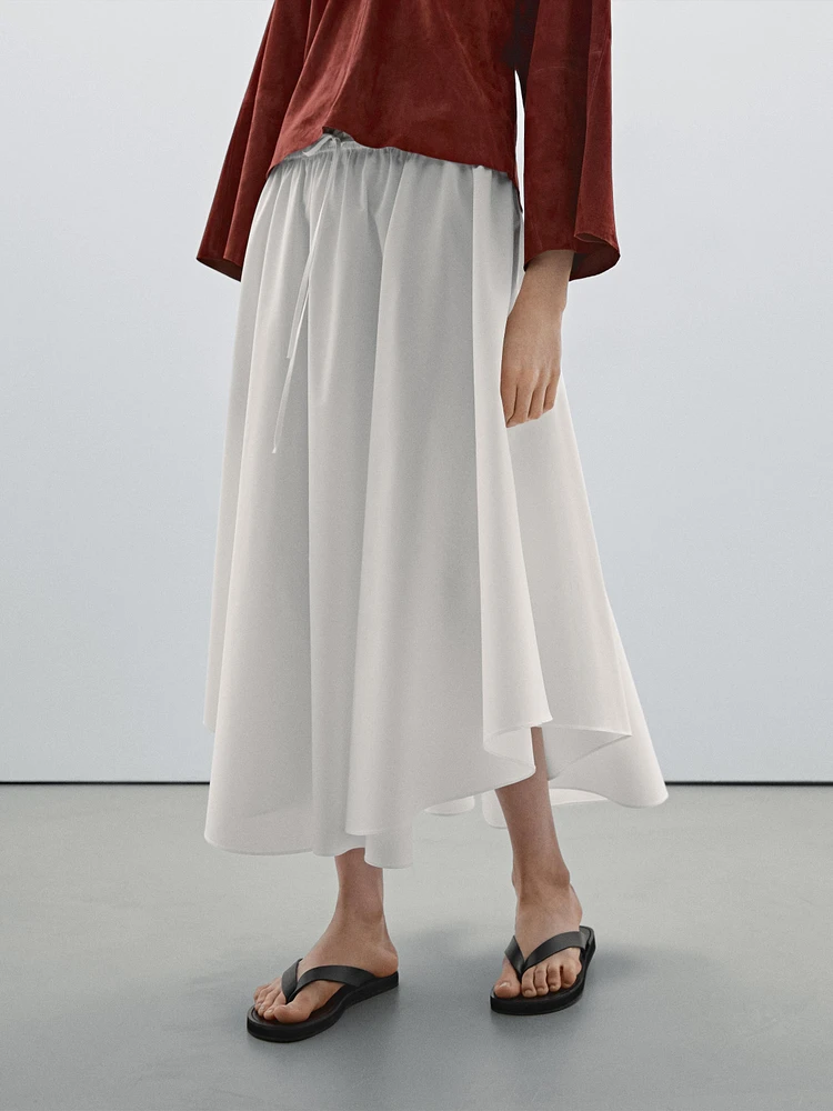 Jupe midi asymétrique fluide