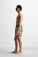 SHORT DE BAIN LONG À IMPRIMÉ FLORAL