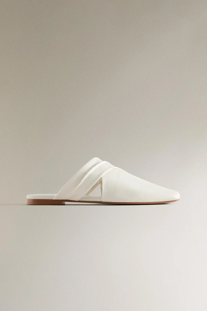 MULES CROISÉES CUIR