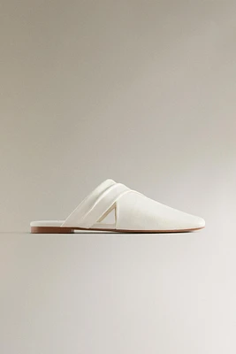 MULES CROISÉES CUIR