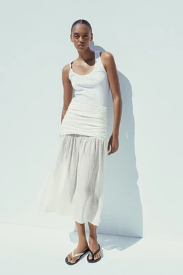 COMBINATION MIDI SKIRT