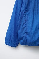 LIGHTWEIGHT PACKABLE WINDBREAKER