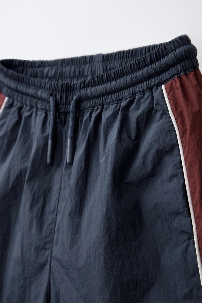 TECHNICAL SHORTS WITH SIDE STRIPES