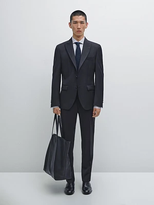 Pantalon de costume uni en laine