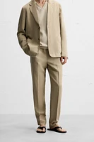 PANTALON DE COSTUME DÉLAVÉ