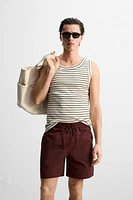 DRAWSTRING SWIM TRUNKS