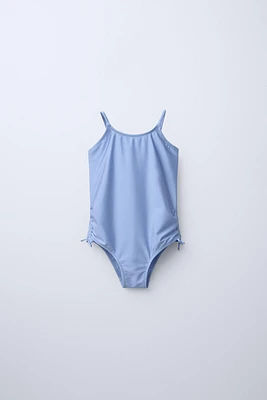 6-14 ANS/ MAILLOT DE BAIN BRILLANT AVEC NŒUDS