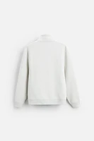 EMBROIDERED QUARTER ZIP SWEATSHIRT