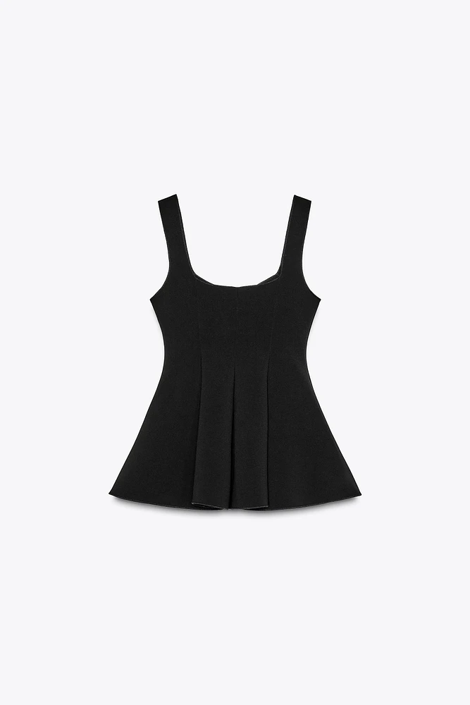 PEPLUM STRETCH TOP