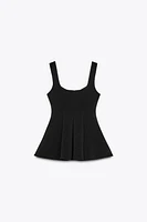PEPLUM STRETCH TOP