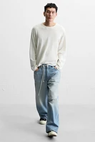 RIPPED BAGGY FIT JEANS