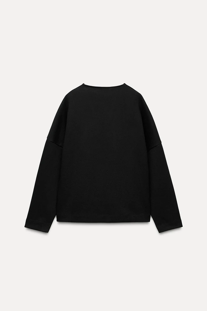 INTERLOCK V-NECK TOP