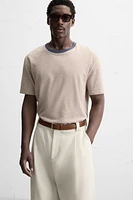 CEINTURE EN CUIR SURPIQUÉE