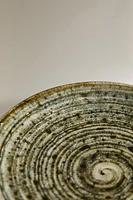 EARTHENWARE SIDE PLATE WITH SPIRAL DESIGN