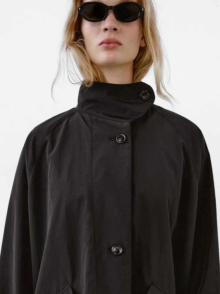 Flowing water-repellent fabric trench coat