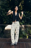 LINEN VEST WITH PERFORATED EMBROIDERY