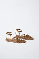 STRAPPY LEATHER SANDALS
