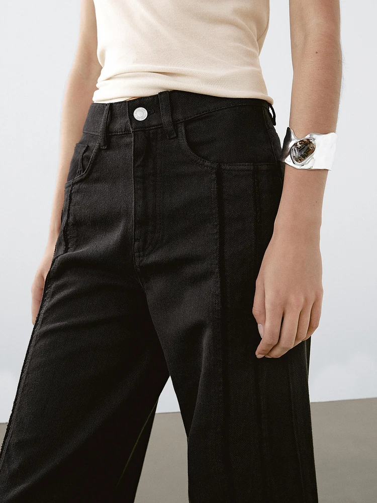 High-waist wide-leg jeans with seam details