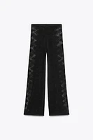 PANTALON EN MAILLE POINTELLE LATÉRAL