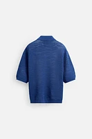 POLO EN MAILLE AJOURÉE