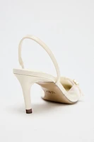 CHAUSSURES OUVERTES À L'ARRIÈRE EN VINYLE AVEC BOUCLE
