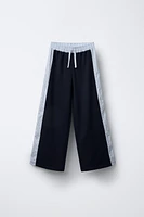 PANTALON JAMBES LARGES À BANDES RAYÉES