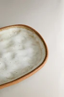 SPOON WITH RAISED DESIGN