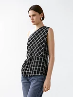 Checked top with asymmetric neckline