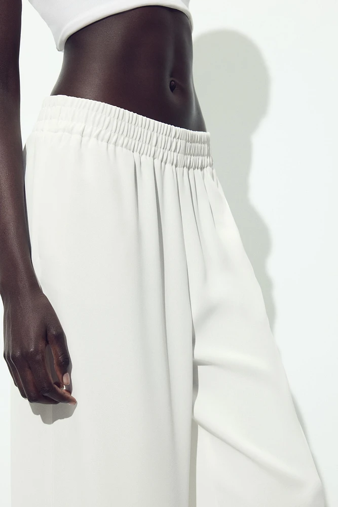 PANTALON EN CRÊPE À JAMBES LARGES