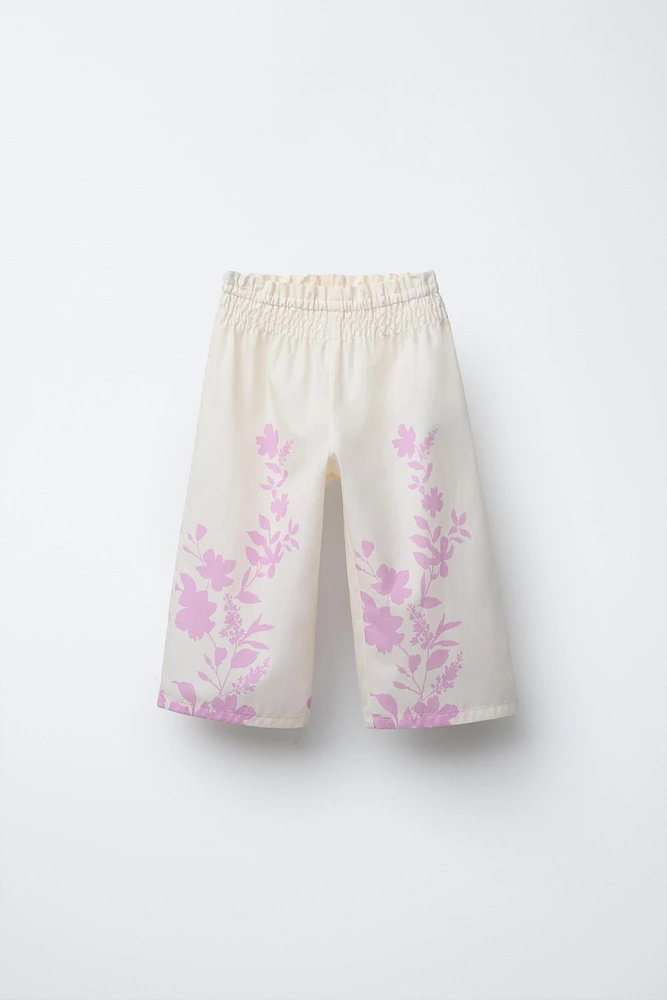 PANTALON EN POPELINE AVEC FLEURS