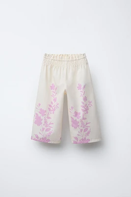 PANTALON EN POPELINE AVEC FLEURS