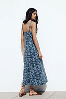 ROBE MIDI BRODERIES AJOURÉES EFFET GOMME