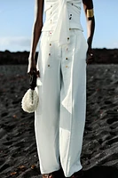 PANTALON LARGE À PINCES