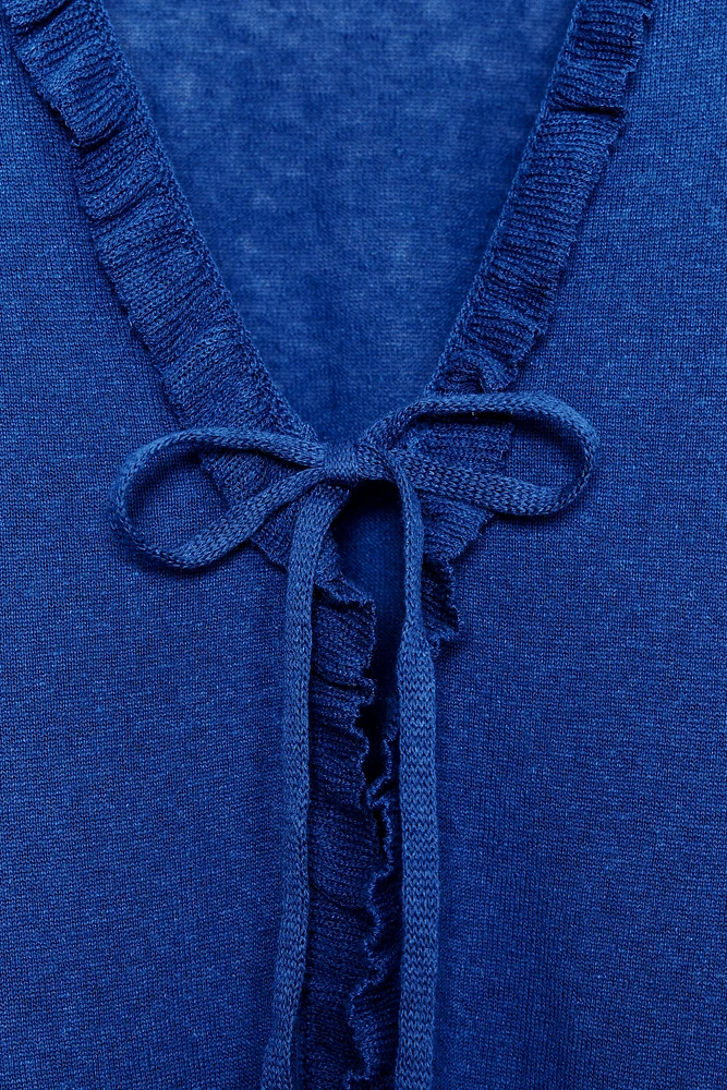 GILET EN MAILLE À VOLANTS