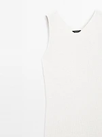 Knit dress with fringed hem