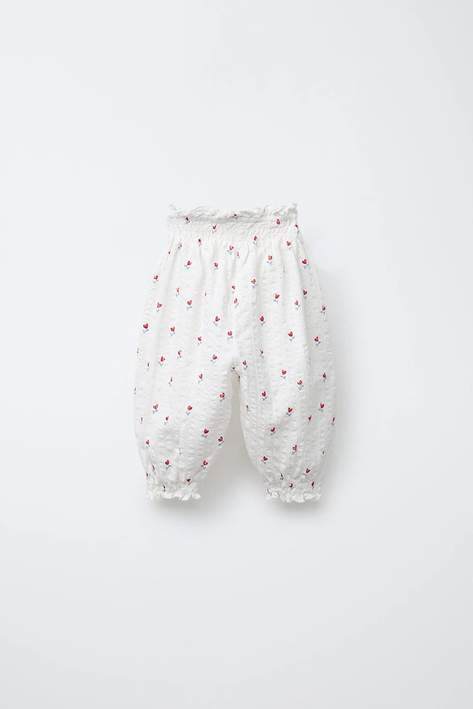 PANTALON À TEXTURE ET IMPRIMÉ FLEURS