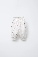 TEXTURED FLORAL PRINT PANTS