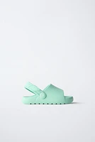 RUBBERIZED SLIDES