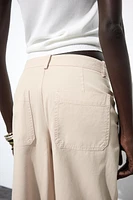 PANTALON CHINO À PINCES