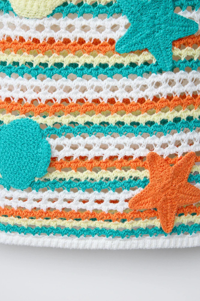 TOP À RAYURES EN MAILLE AVEC MOTIFS MARINS