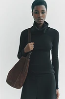 ASYMMETRIC SOFT SUEDE BUCKET BAG