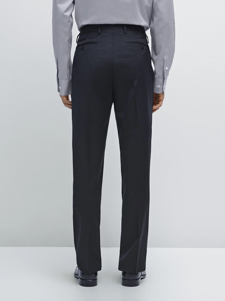 Pantalon de costume uni en laine