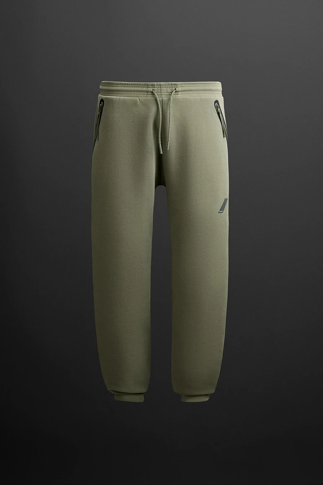 PANTALON DE JOGGING TECHNIQUE À ZIPS