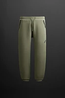 PANTALON DE JOGGING TECHNIQUE À ZIPS