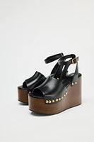 STUDDED LEATHER WEDGE SANDALS