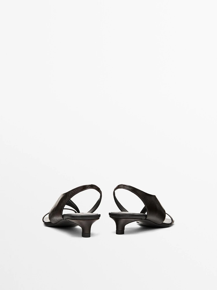 Asymmetric heeled sandals