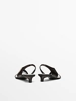 Asymmetric heeled sandals
