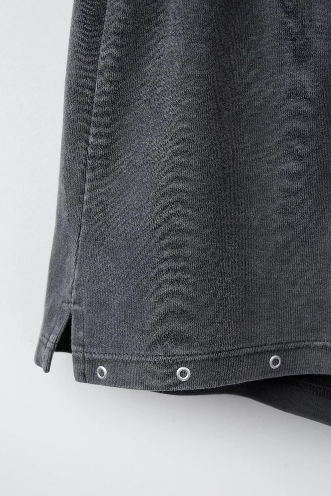 WASHED EFFECT STUDDED BERMUDA SHORTS
