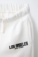 RAISED TEXT JOGGING PANTS