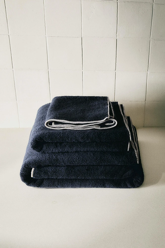 OVERLOCK COTTON BATH TOWEL